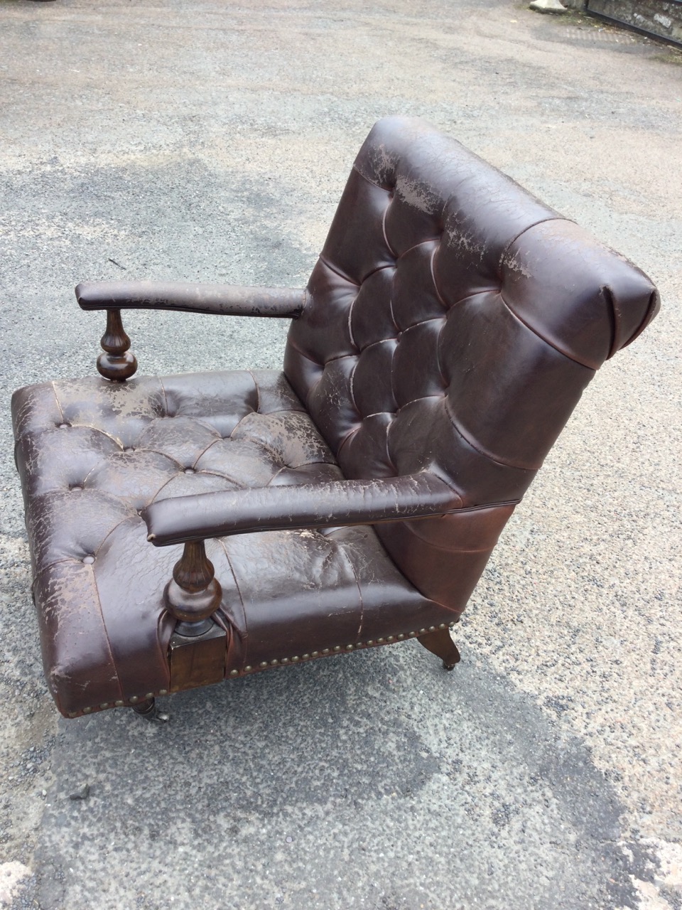 A leather button upholstered armchair, the wide brass studded seat having armrests on fluted - Image 3 of 3