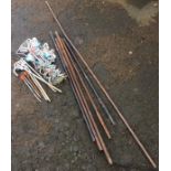 A quantity of dog anchors with swing lead rings; and other stakes, metal poles, etc. (A lot)