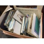 A box of old postcards, photographs, ephemera, an OS map, certificates, the postcards mainly GB