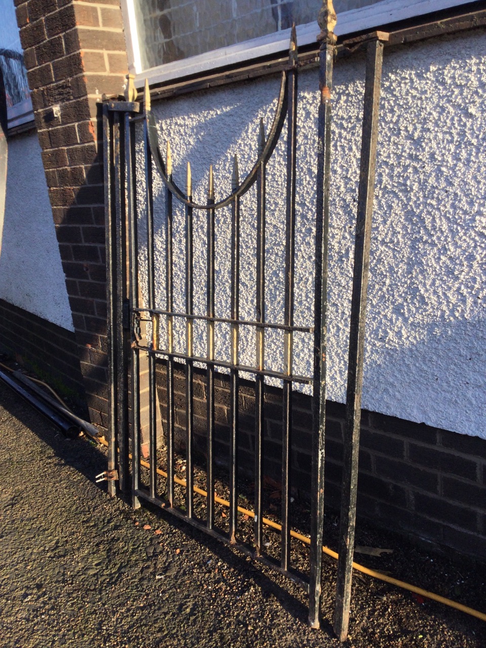 A cast iron garden gate with side posts, the vertical square spindles with spear finials, having - Image 2 of 3