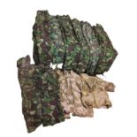 34 pieces of army camouflage clothing including desert wear - jackets & trousers. (34)