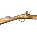 A Victorian 12 bore single barrel flintlock fouling gun with wood tamper rod and steel barrel. (58.