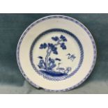 An eighteenth century Chinese blue & white tin glazed delft plate decorated with pine tree and two