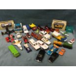 A collection of Corgi, Dinky, Matchbox cars, etc., including transporters, police cars, lorries,