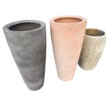 A pair of tall circular tapering resin garden pots in a rough cast terracotta & grey finish - 31.