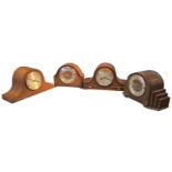 Four oak cased 1930s Westminster chime mantleclocks - two by Smiths of Enfield, the circular dials