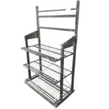 A set of workshop shelves with rectangular frame supporting three platforms with extended aprons,