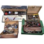 A rectangular joiners toolbox with saws, screwdrivers, materials, etc; and two other toolboxes