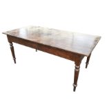 A 6ft rectangular stained Victorian style table raised on turned tapering legs. (72in x 35.5in x
