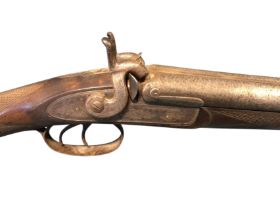 A double barrel 12 bore game gun by Chard of Croydon, with twin percussion cap hammers, walnut