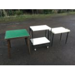 A square folding card table with baize top; a folding trolley table with two rectangular tray