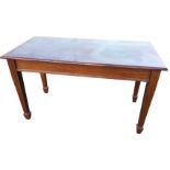 A rectangular Edwardian mahogany serving table, with rectangular moulded top on square tapering legs