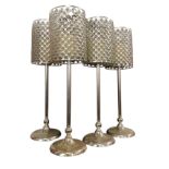A set of four silver plated battery powered tablelamps, with tubular crystal mounted mesh shades