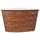 A nineteenth century bowfronted mahogany chest of drawers, the boxwood strung top with chequered