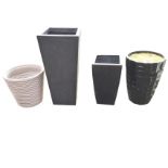 Four miscellaneous garden pots - ribbed tapering, black, square tapering relief moulded, etc. (35.