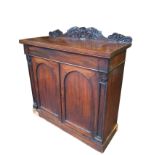 A nineteenth century mahogany chiffonier with acanthus scroll carved back to rectangular top,