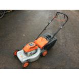 A Flymo Quicksilver 40 self-drive rotary garden mower with Briggs & Stratton 46SD petrol engine.