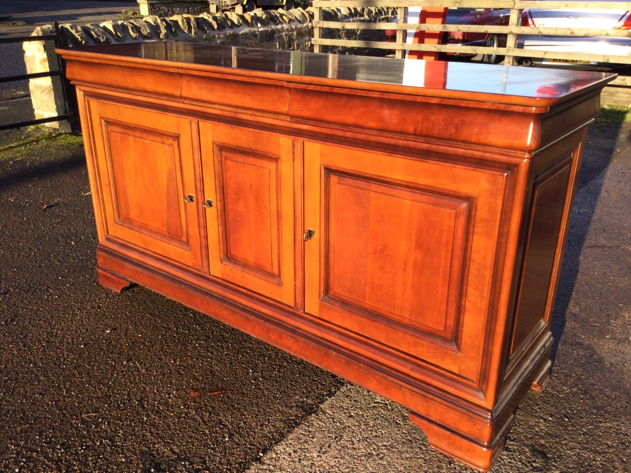 A reproduction mahogany sideboard having rectangular rounded top above three cushion moulded - Image 2 of 3