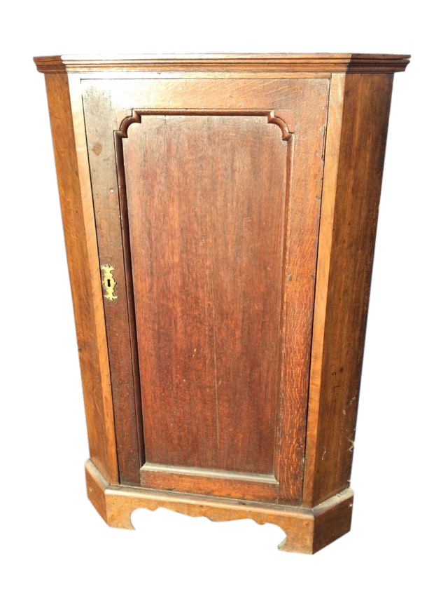 A nineteenth century oak corner cabinet with panelled door enclosing shaped shelves, raised on a