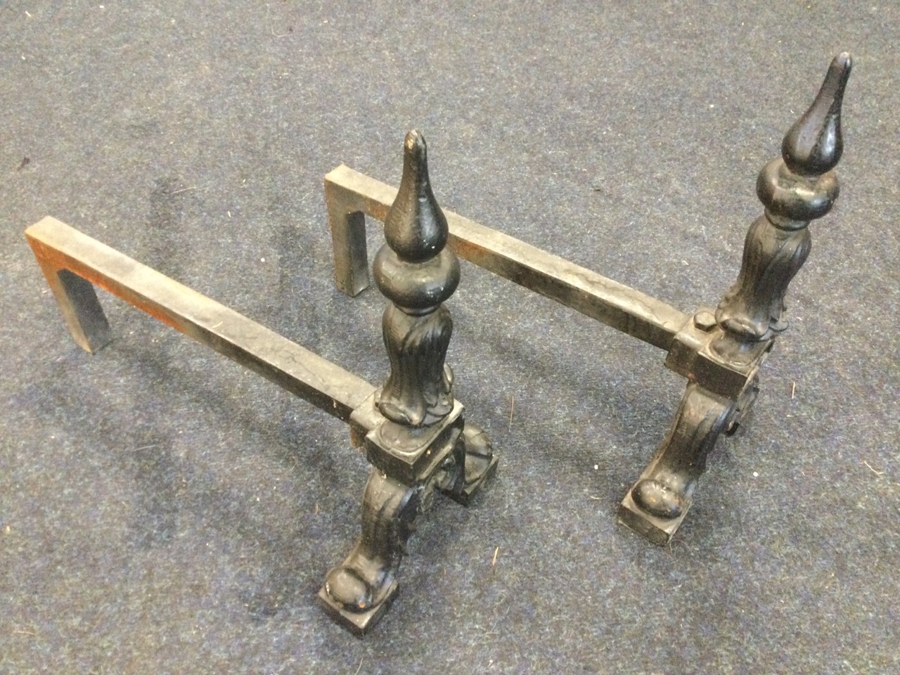 A pair of cast andirons, the columns with pointed finials on leaf scrolled supports, the back - Image 3 of 3
