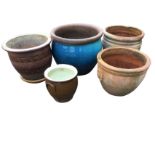 Five terracotta/stoneware garden pots with miscellaneous decoration - blue glazed, scraffito,