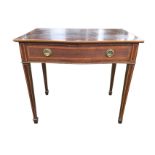 A serpentine fronted mahogany serving table, the satinwood crossbanded frieze drawer mounted with