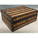 A Victorian porcupine quill box with rectangular framed panels inlaid with bone dots, having