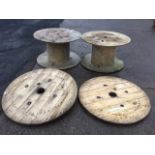 A pair of circular pine ends from a cable drum - 43in dia; and a pair of plywood cable drums