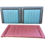 Three vinyl upholstered headboards, with fluted panels framed by cushion borders - two single &