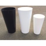 A pair of black & white circular tapering new garden pots - 30.25in; and another similar smaller -