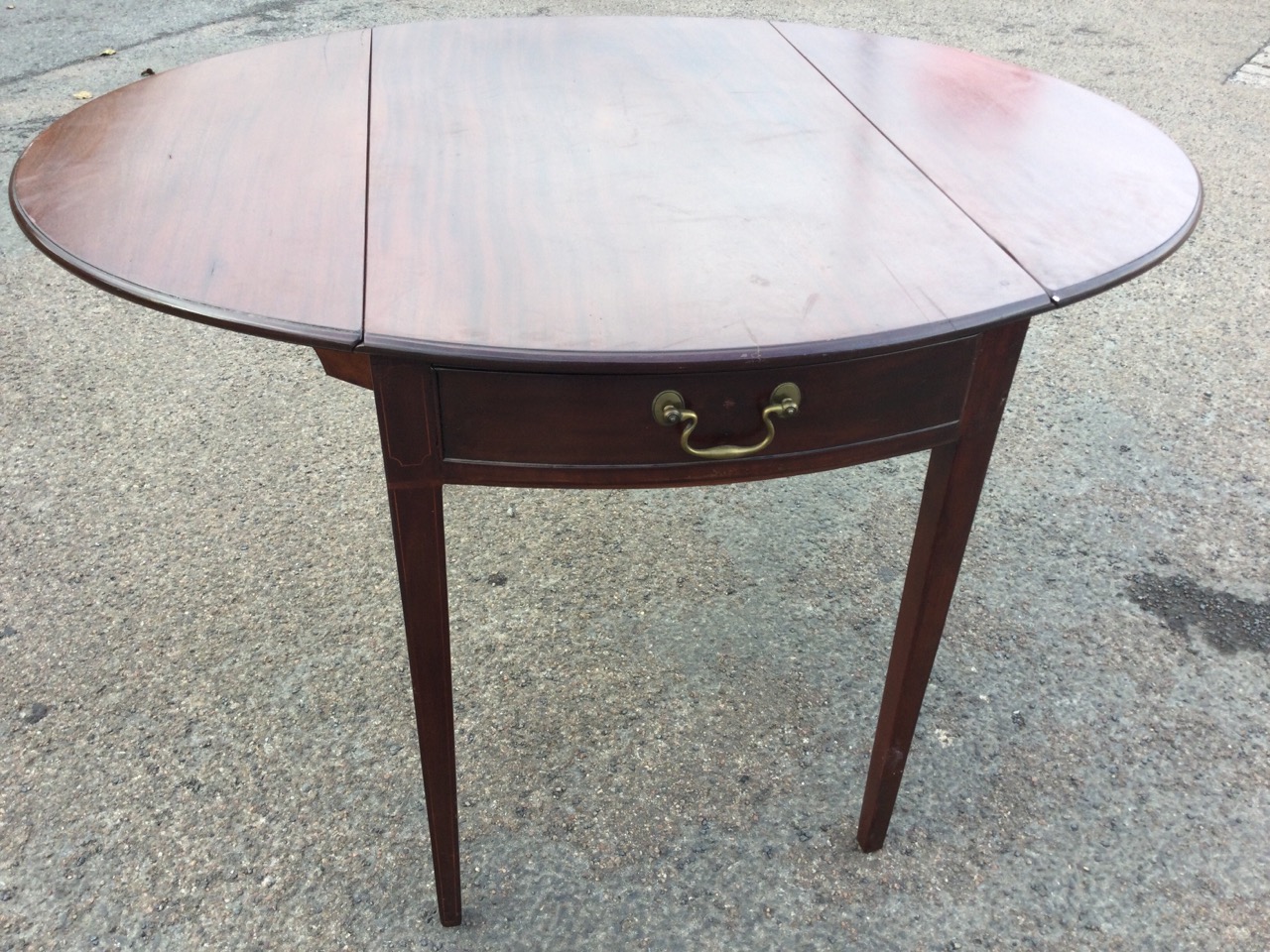 A nineteenth century oval mahogany pembroke table with two rule-jointed drop leaves, the - Image 2 of 3