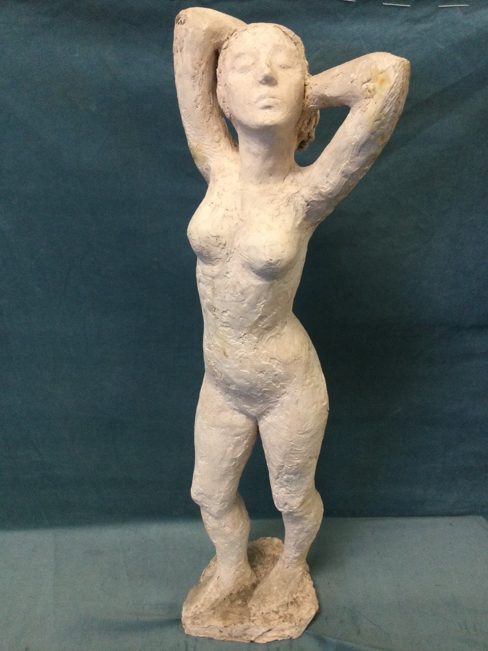 A C20th nude figurative female sculpture, composition clay with wire reinforcement and paint, on