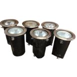 A set of six contemporary Erco uplighters, the tubular cases for ground burial, having stainless
