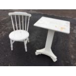 A white painted spindleback Ibex chair with circular seat; and a painted occasional table with