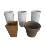 A set of three tall tapering resin planters with hexagonal honeycomb mottled finish - 30in; and