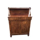 A nineteenth century Gillow style mahogany chifffonier, the top with brass gallery to shelf on