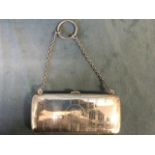 A hallmarked ladies silver purse/bag on chain with banded engine turned decoration, having lined