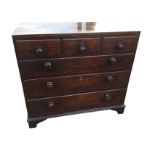 An eighteenth century mahogany chest of drawers mounted with later knobs, with three short drawers