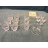 A set of nine Stuart crystal tumblers; a set of four cut glass sherry glasses, and another; and a