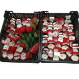 Seventy-one novelty rings in presentational boxes - red roses, shells, teddy bears, Christmas trees,