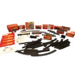 A Tri-ang Hornby dublo gauge part train set with loose track, boxed trucks, platform unit,