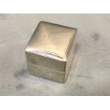 A sterling silver ring box with fitted cushion interior. (1.25in x 1.25in)