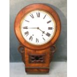 A Victorian walnut cased drop-dial wallclock, with roman chapters and brass bezel, the pendulum