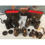 A pair of Lieberman & Gortz 12 x 50 field glasses; a cased wide angled pair of binoculars -