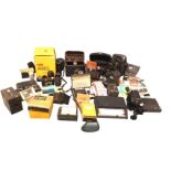 A quantity of photographic equipment, cameras, lenses, a boxed Instamatic movie projector,