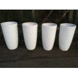 A set of four tall tapering resin garden pots with hexagonal honeycomb mesh type finish. (30in) (4)