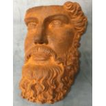 A cast iron classical mask of a bearded man. (10in)