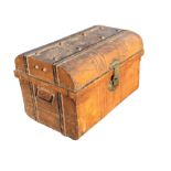A small Victorian scumbled tin trunk with domed studded lid and brass hasp lock, having carrying