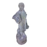 A three-quarter life-size composition stone figure of an art nouveau style lady with basket of