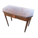 A nineteenth century mahogany turn-over-top tea table, the twin canted leaves with ribbed edges
